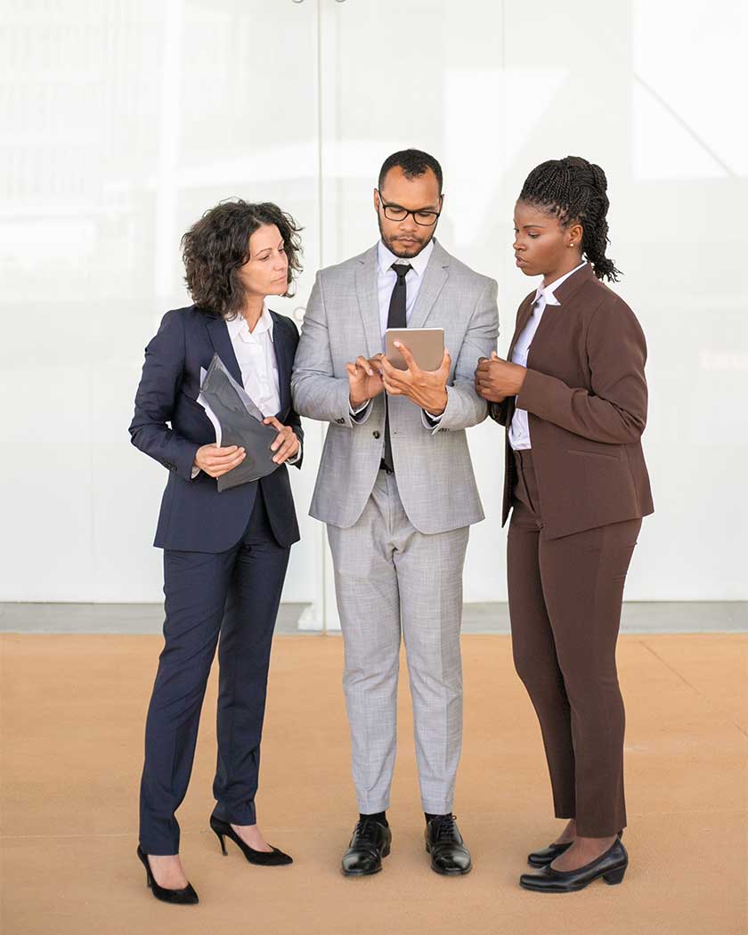 Business team meeting with a consultant managing corporate visa and documentation support