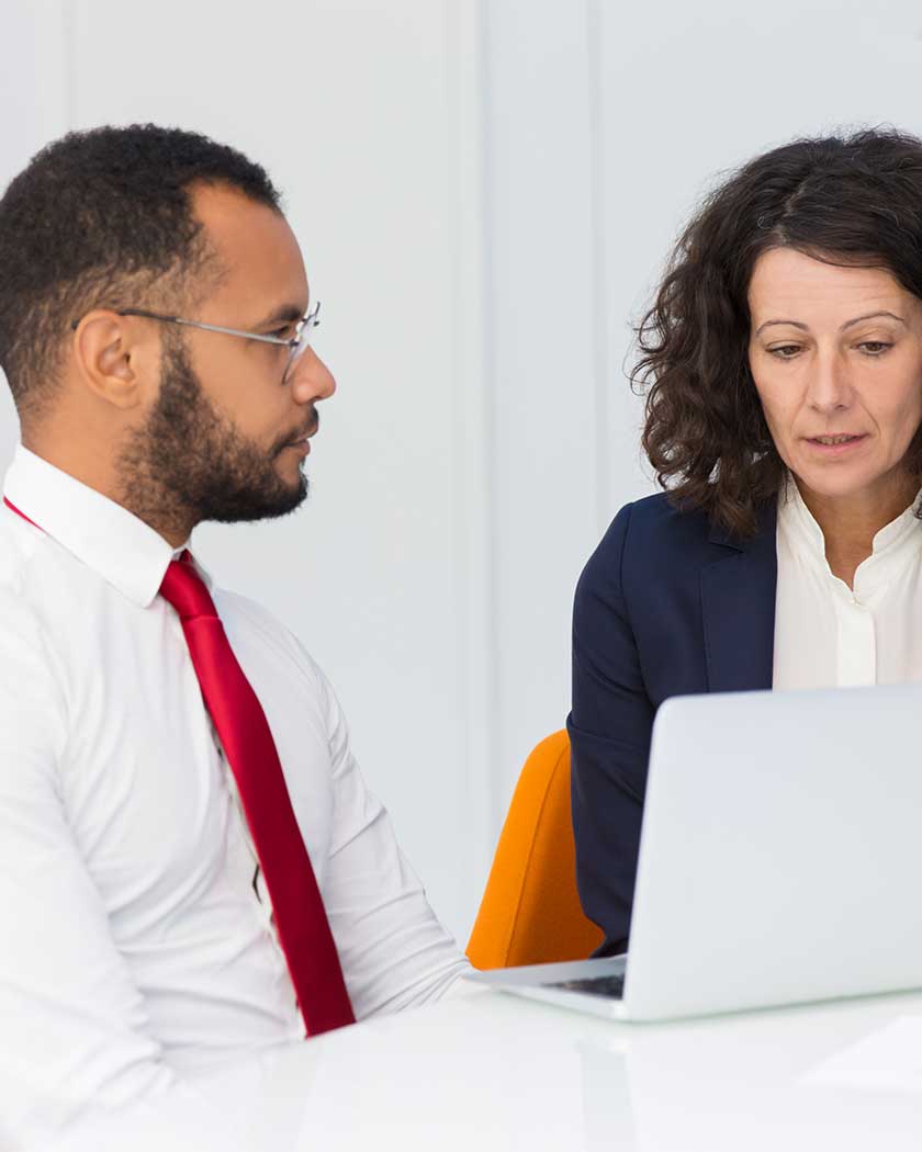 Consultant assisting a client with Saudi and Schengen visa application documents